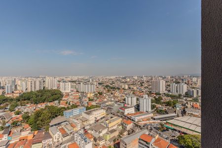 Apartamento à venda com 46m², 2 quartos e 1 vagaVista panorâmica da cidade com muitos prédios e edifícios altos, com um céu azul claro e poucas nuvens.