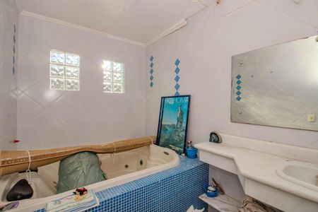 Casa para alugar com 250m², 4 quartos e 3 vagasBanheiro da Suíte