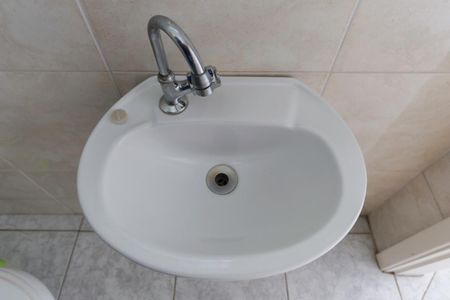 Casa à venda com 150m², 3 quartos e 4 vagas Casa à venda com 150m², 3 quartos e 4 vagasLavabo da garagem