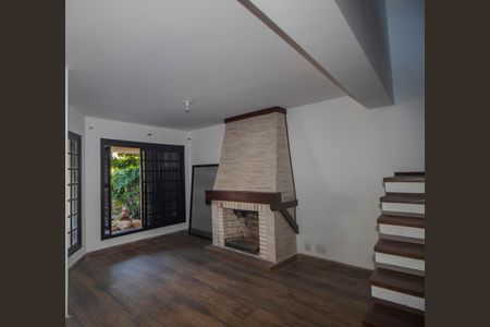 Sala de casa à venda com 3 quartos, 220m² em Guarujá, Porto Alegre