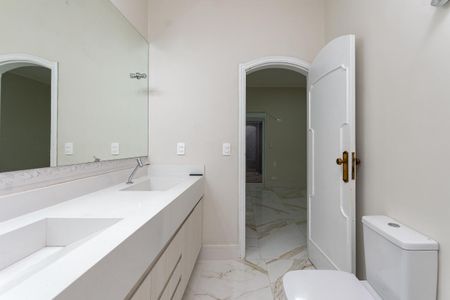 Casa para alugar com 650m², 4 quartos e 8 vagasBanheiro do quarto 1 Suíte