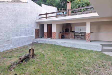 Casa de condomínio à venda com 258m², 3 quartos e 4 vagasQuintal