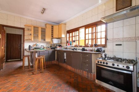 Casa de condomínio à venda com 338m², 4 quartos e 3 vagas Casa de condomínio à venda com 338m², 4 quartos e 3 vagasCozinha