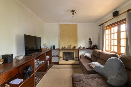 Casa de condomínio à venda com 338m², 4 quartos e 3 vagas Casa de condomínio à venda com 338m², 4 quartos e 3 vagasSala