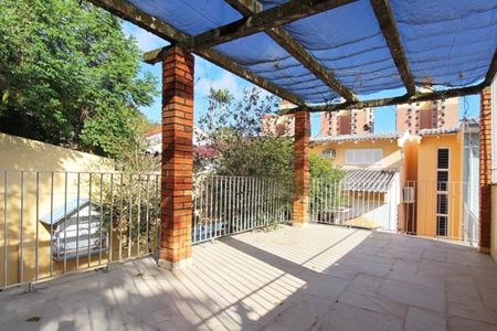 Varanda de casa à venda com 3 quartos, 229m² em Teresópolis, Porto Alegre