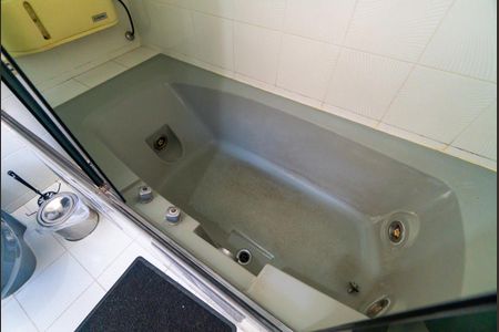 Casa à venda com 450m², 4 quartos e 2 vagas Casa à venda com 450m², 4 quartos e 2 vagasBanheiro da Suíte 1