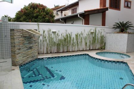 Casa de condomínio para alugar com 409m², 4 quartos e 3 vagas