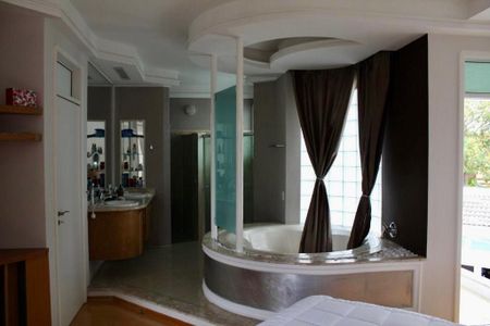 Casa de condomínio para alugar com 409m², 4 quartos e 3 vagas