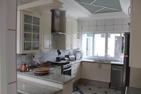 Casa de condomínio para alugar com 409m², 4 quartos e 3 vagas