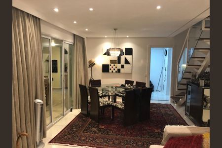 Apartamento à venda com 220m², 6 quartos e 3 vagas Apartamento à venda com 220m², 6 quartos e 3 vagasSala com mesa de vidro e cadeiras de madeira, com uma decoração moderna e elegante.