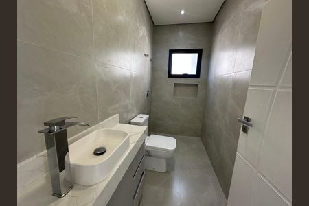 Casa de condomínio à venda com 304m², 4 quartos e 4 vagasBanheiro 1