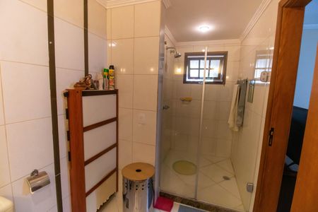 Casa de condomínio à venda com 230m², 4 quartos e 2 vagasBanheiro da Suíte 1