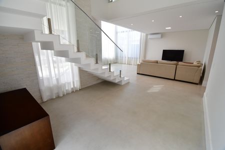 Casa de condomínio para alugar com 295m², 4 quartos e 4 vagasSala