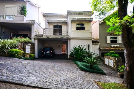 Casa de condomínio à venda com 394m², 4 quartos e 4 vagasFachada
