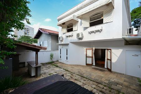 Casa de condomínio à venda com 394m², 4 quartos e 4 vagasFachada Posterior