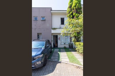 Casa de condomínio à venda com 100m², 3 quartos e 2 vagasFachada/Garagem