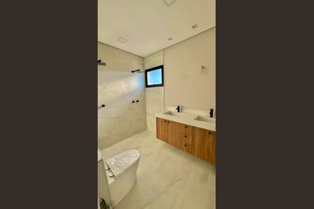 Casa de condomínio à venda com 225m², 3 quartos e 4 vagasBanheiro 1