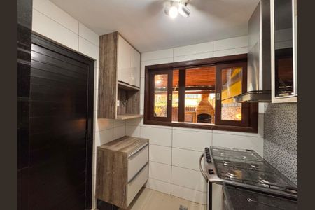 Casa de condomínio para alugar com 210m², 4 quartos e 2 vagasCozinha 
