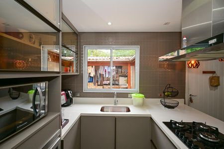 Casa de condomínio para alugar com 123m², 2 quartos e 2 vagasCozinha