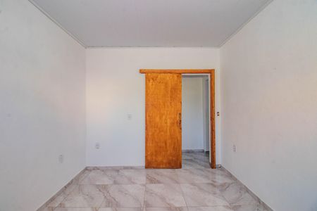 Quarto 1 de casa para alugar com 2 quartos, 65m² em Mário Quintana, Porto Alegre