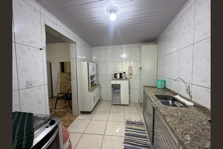Casa à venda com 121m², 2 quartos e 2 vagas Casa à venda com 121m², 2 quartos e 2 vagasCozinha