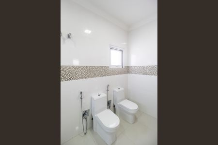 Casa de condomínio para alugar com 415m², 4 quartos e 3 vagasBanheiro da Suíte