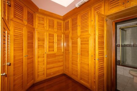 Casa de condomínio à venda com 450m², 5 quartos e 6 vagasSuíte 1