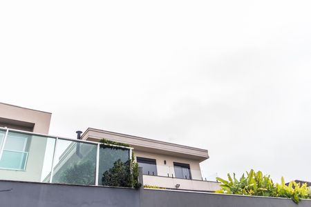 Casa de condomínio à venda com 423m², 4 quartos e 4 vagas Casa de condomínio à venda com 423m², 4 quartos e 4 vagasVista da Suíte