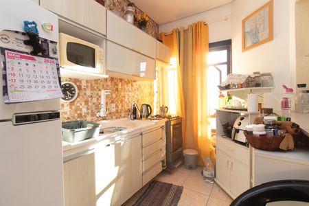 Cozinha e Área de Serviço de casa à venda com 5 quartos, 267m² em Vila Nova, Porto Alegre