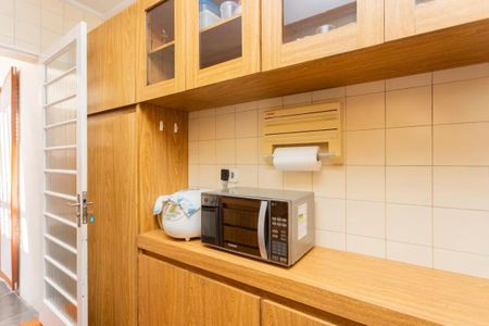 Casa à venda com 104m², 3 quartos e 2 vagas Casa à venda com 104m², 3 quartos e 2 vagasCozinha