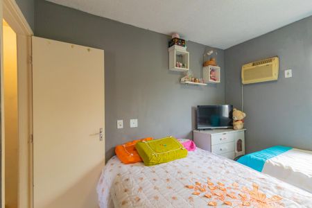 Quarto 1 de casa de condomínio à venda com 2 quartos, 60m² em Igara, Canoas