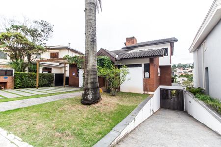 Casa de condomínio à venda com 426m², 5 quartos e 4 vagas Casa de condomínio à venda com 426m², 5 quartos e 4 vagasVista da Rua