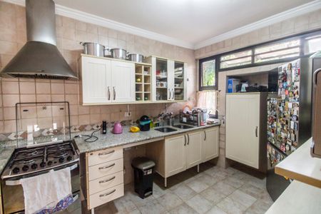 Casa de condomínio à venda com 426m², 5 quartos e 4 vagas Casa de condomínio à venda com 426m², 5 quartos e 4 vagasCozinha