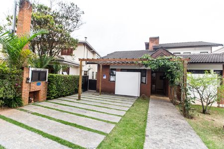 Casa de condomínio à venda com 426m², 5 quartos e 4 vagas Casa de condomínio à venda com 426m², 5 quartos e 4 vagasGaragem