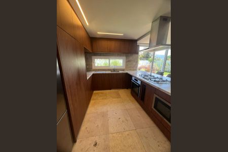 Casa de condomínio para alugar com 270m², 4 quartos e 2 vagasCozinha