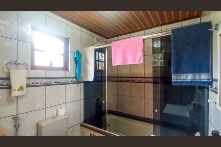 Casa à venda com 170m², 4 quartos e 2 vagasBanheiro suite 