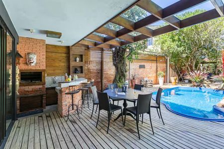 Casa de condomínio para alugar com 339m², 5 quartos e 4 vagas