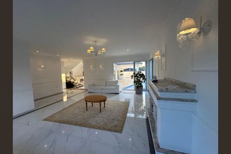 Casa de condomínio para alugar com 450m², 4 quartos e 4 vagasSala