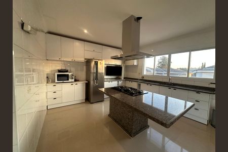 Casa de condomínio para alugar com 450m², 4 quartos e 4 vagasCozinha