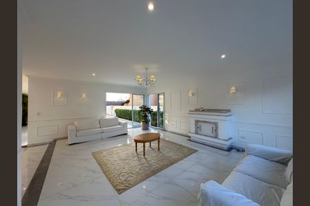 Casa de condomínio para alugar com 450m², 4 quartos e 4 vagasSala
