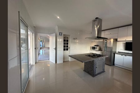 Casa de condomínio para alugar com 450m², 4 quartos e 4 vagasCozinha