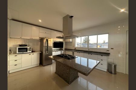 Casa de condomínio para alugar com 450m², 4 quartos e 4 vagasCozinha