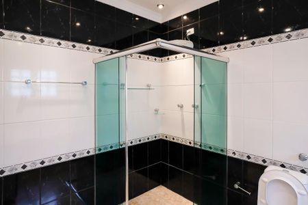Casa à venda com 490m², 4 quartos e 6 vagasBanheiro da suíte 3
