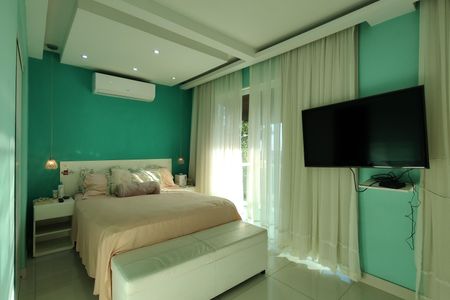 Casa de condomínio à venda com 650m², 4 quartos e 4 vagas Casa de condomínio à venda com 650m², 4 quartos e 4 vagasSuíte