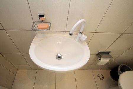 Casa de condomínio para alugar com 142m², 4 quartos e 2 vagas Casa de condomínio para alugar com 142m², 4 quartos e 2 vagasBanheiro de Serviço