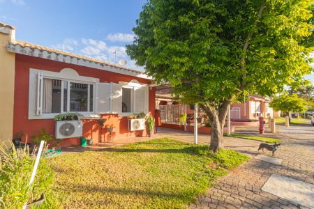 Fachada de casa de condomínio à venda com 3 quartos, 96m² em Rio Branco, Canoas
