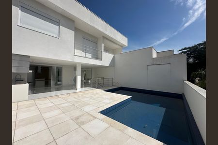 Casa de condomínio à venda com 390m², 4 quartos e 4 vagasFachada