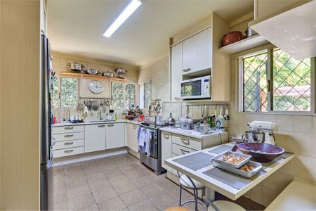 Casa à venda com 411m², 4 quartos e 4 vagas