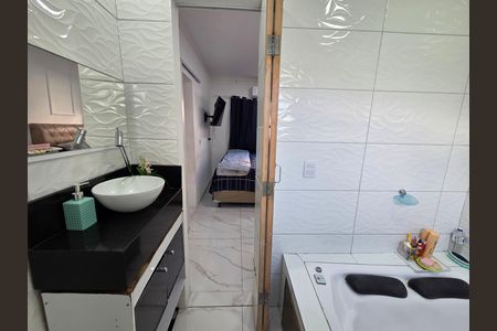 Casa de condomínio para alugar com 84m², 3 quartos e 1 vaga Casa de condomínio para alugar com 84m², 3 quartos e 1 vagaBanheiro da Suíte 1