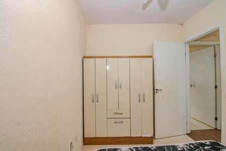 Quarto 1 de apartamento para alugar com 2 quartos, 56m² em Mário Quintana, Porto Alegre